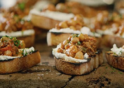 Crostini with Sausage Ragout and Ricotta Cheese