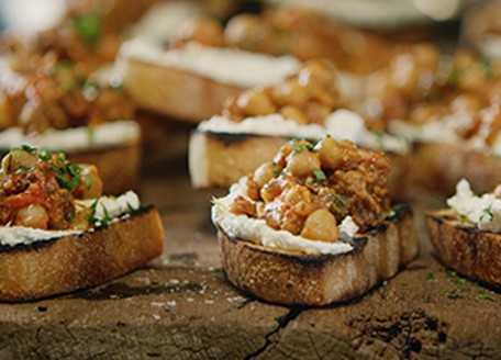 Crostini with Sausage Ragout and Ricotta Cheese